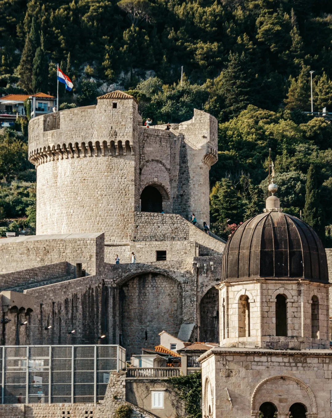 Stone fortress and church dome in Dubrovnik