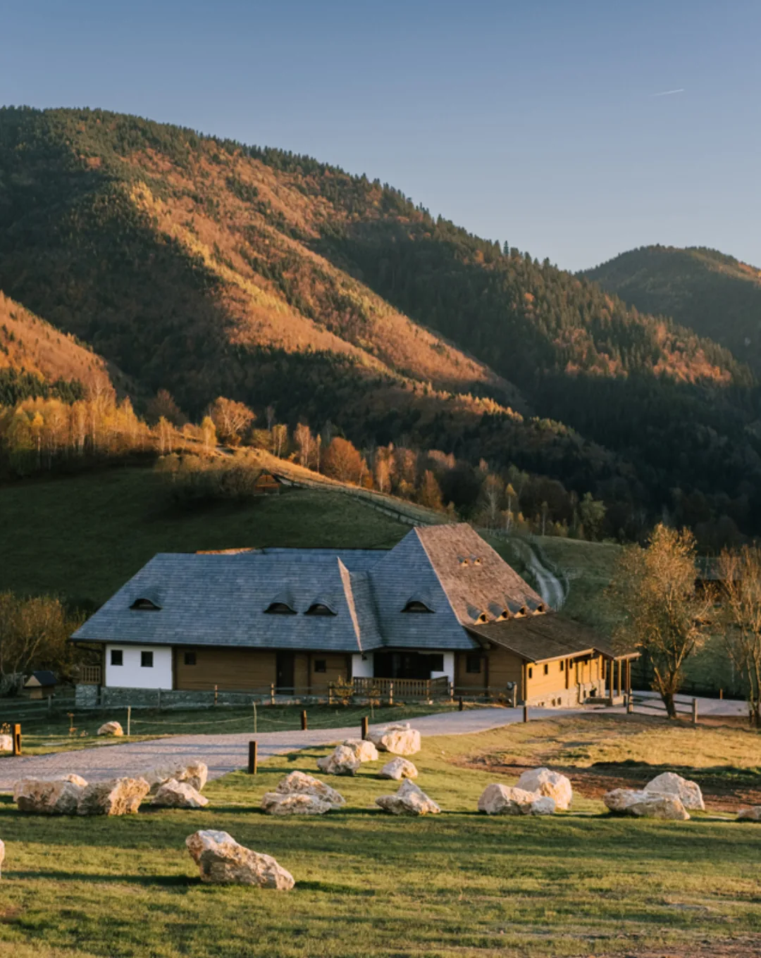 Wooden farmhouse in a Carpathian mountain valley