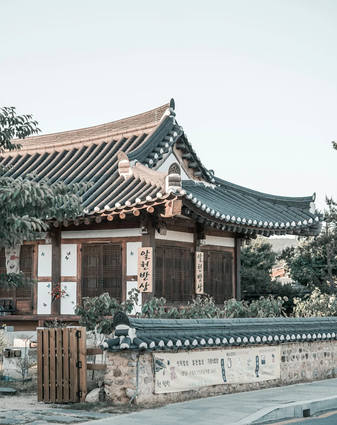 Traditional hanok house with a tiled roof in winter