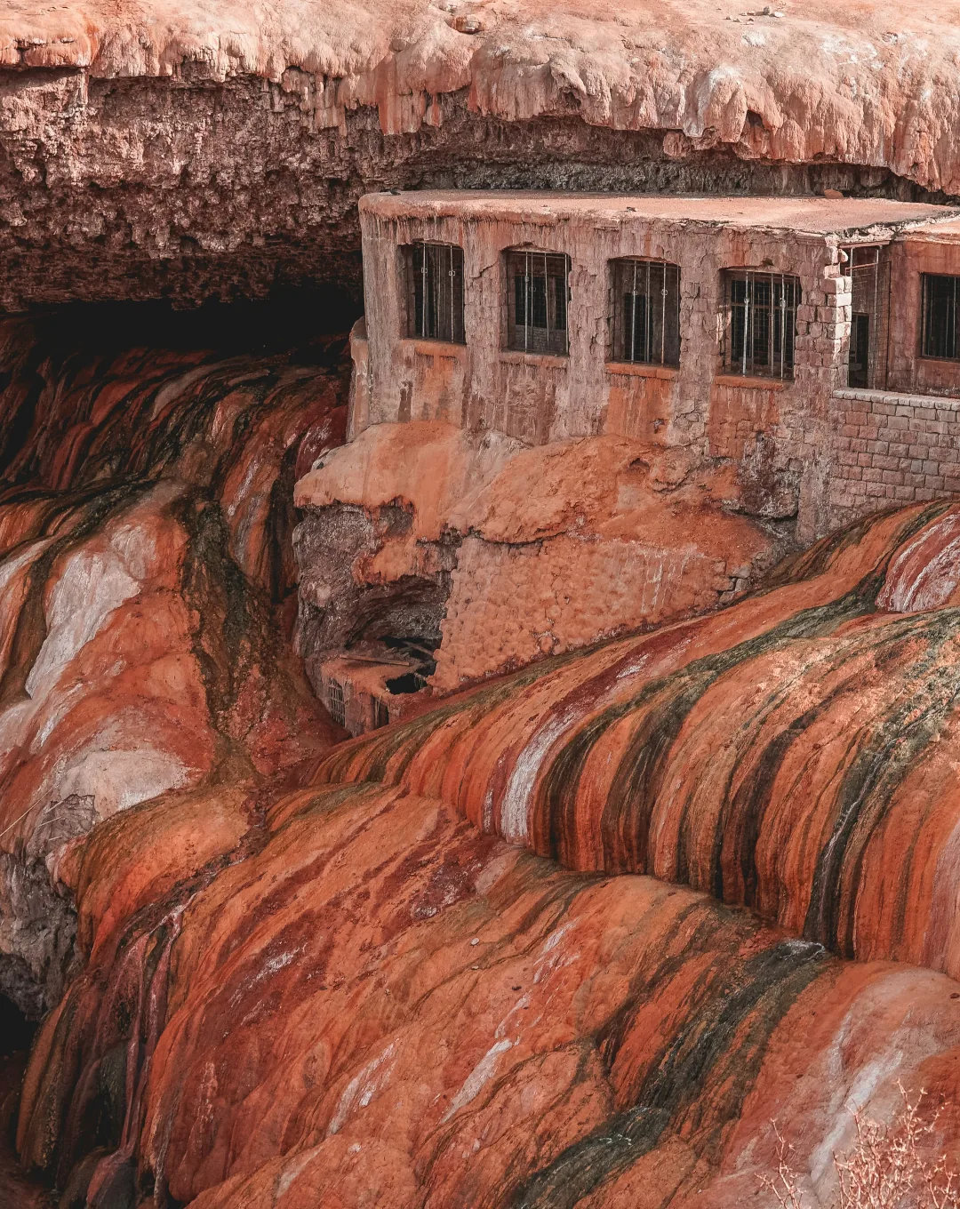 Red and ochre rock formations in the Andes of Argentina