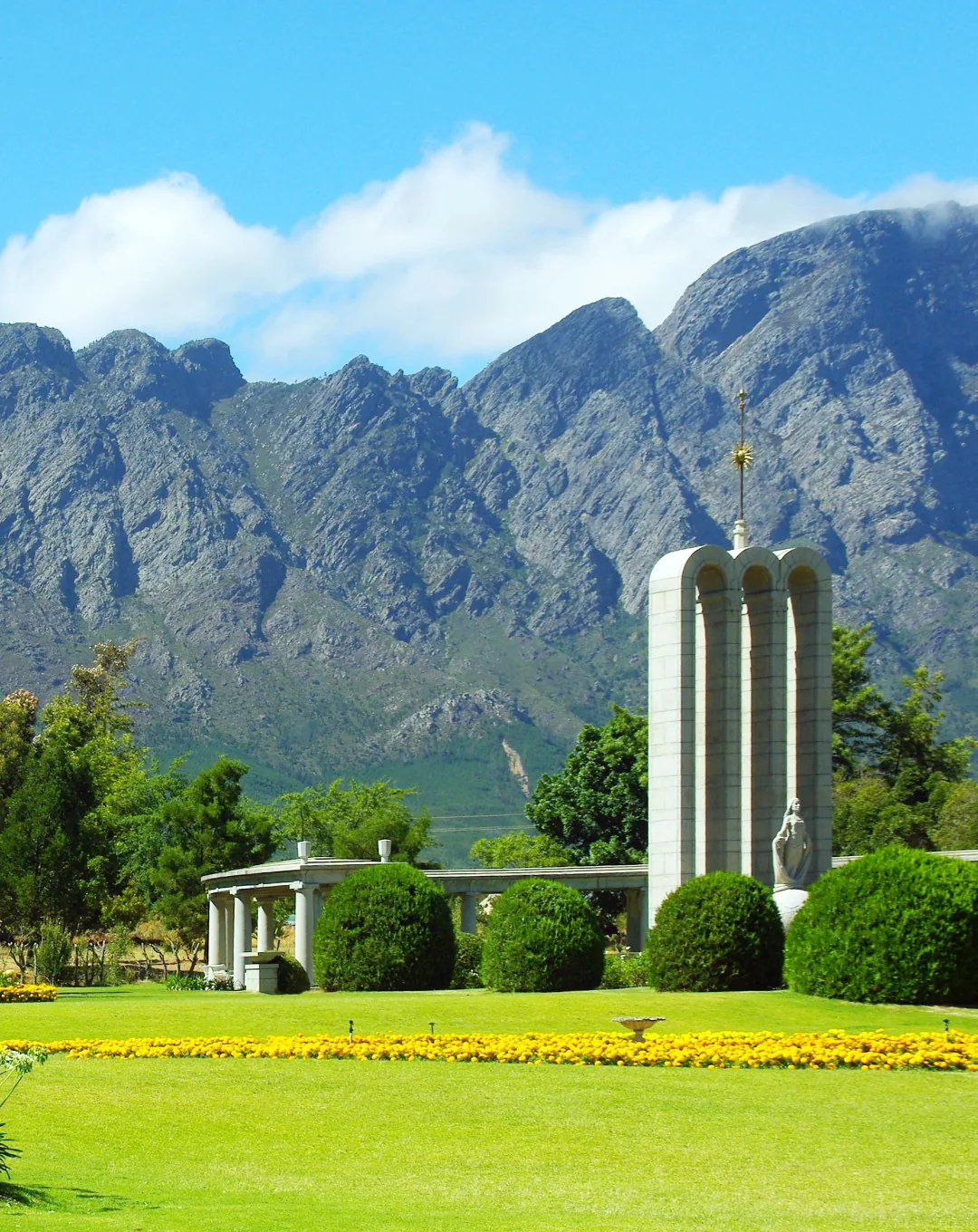 Wine estate lawns below mountains in Franschhoek